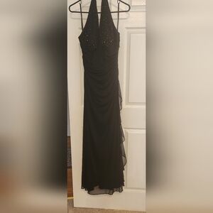 Size 8 black halter top dress with rhinestone at the neck line